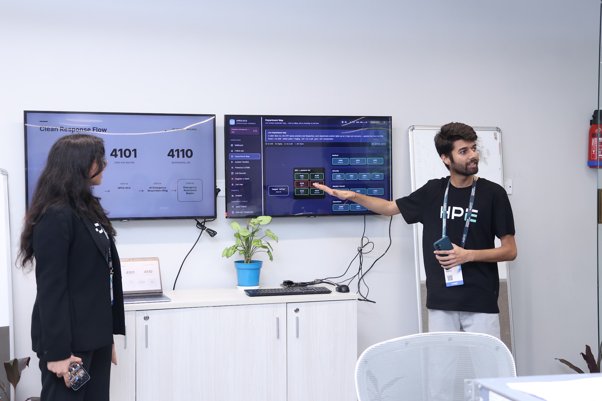 The UPES-ECS operations console shown live on screen, with responder desks 4101 and 4110.